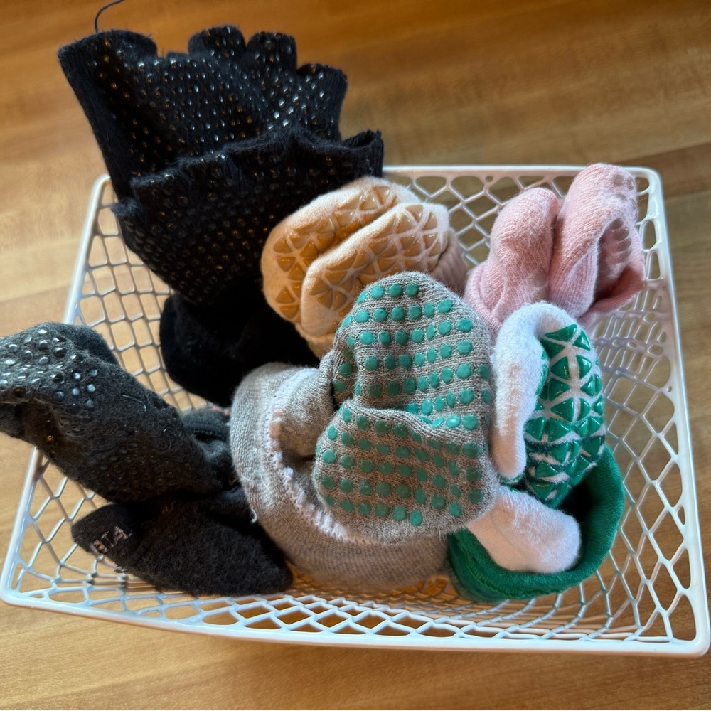 Assorted Grip Socks in Black, Pink, and Green.